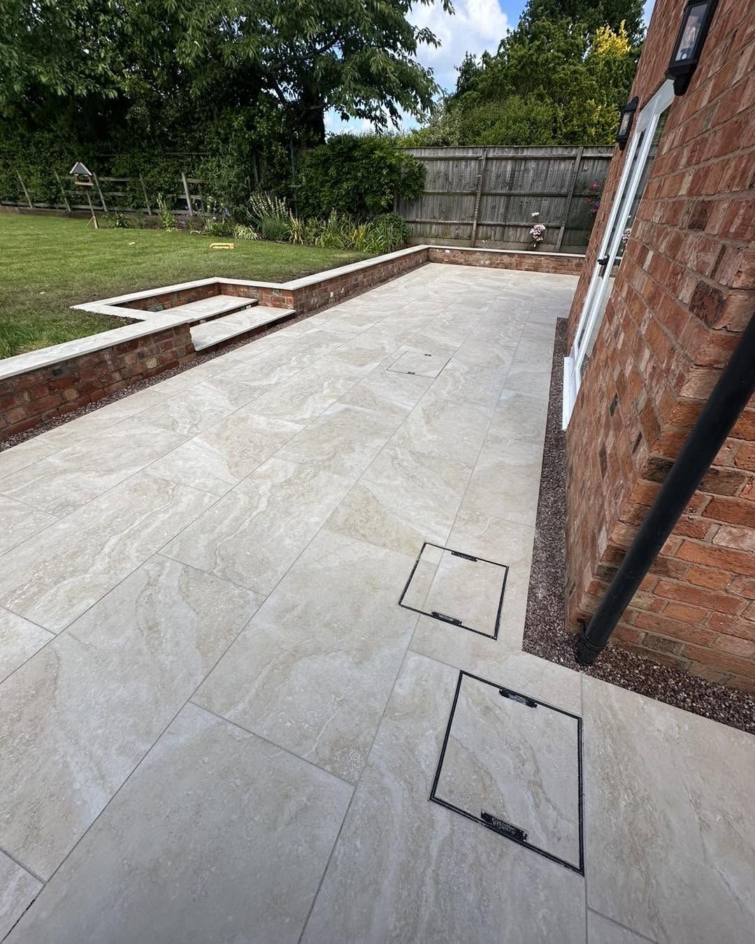 Porcelain patio beside house