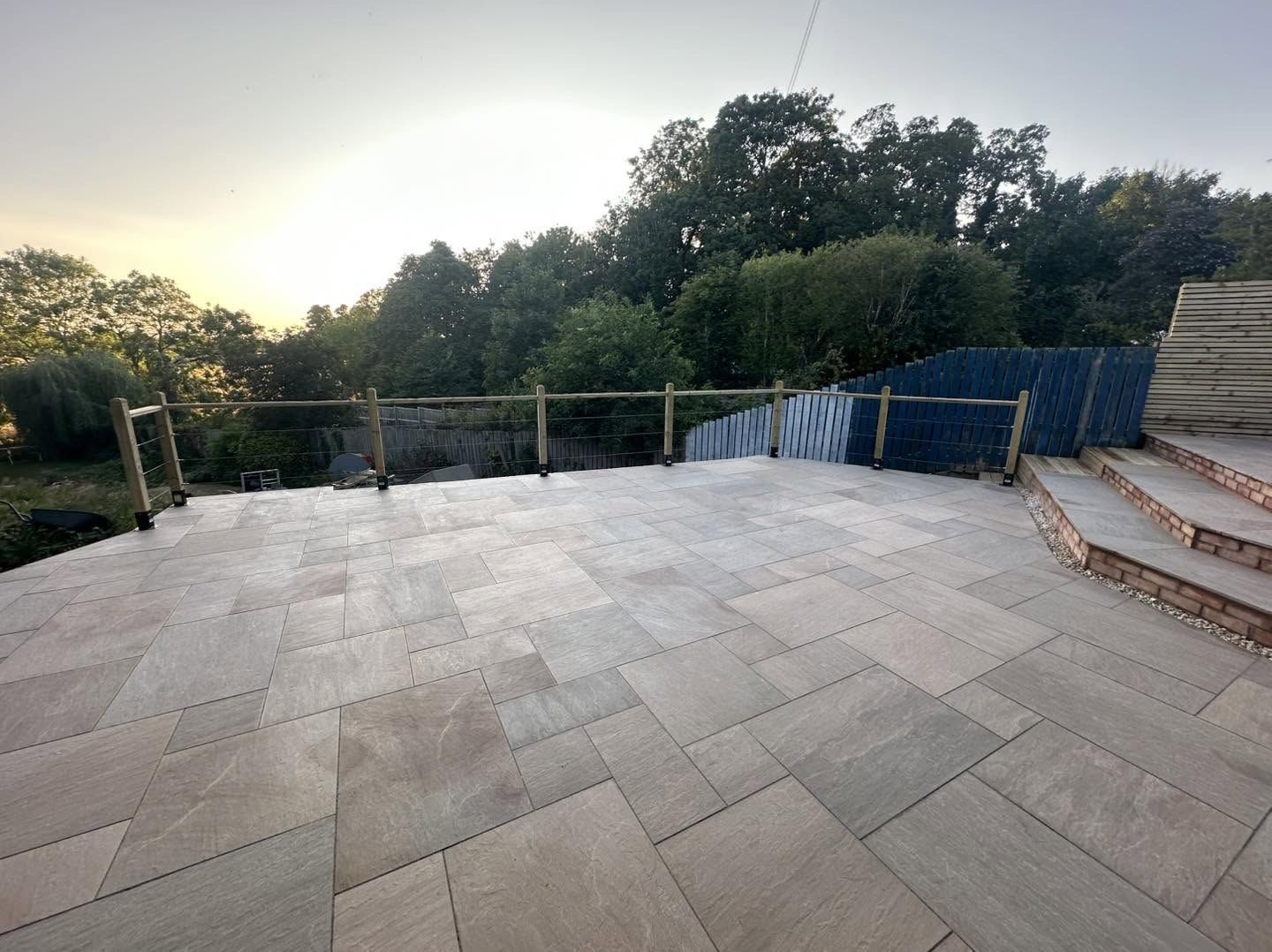 Large sandstone patio with steps